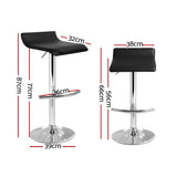 Set of 4 Artiss black gas lift bar stools at kitchen island — Allure Home Collections