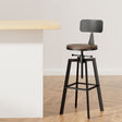Tooradin black industrial swivel bar stool with elm wood seat in a modern kitchen