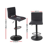 Ryanston linen gas lift bar stool black beside a kitchen island