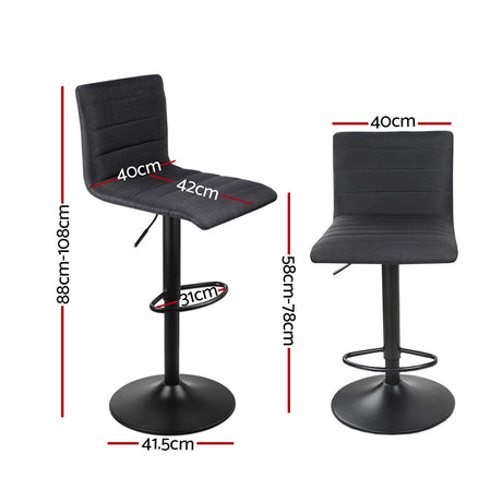 Ryanston linen gas lift bar stool black beside a kitchen island