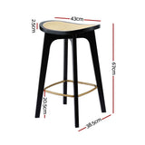 Grantville backless woven rattan bamboo bar stool at a kitchen counter