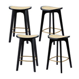 Grantville backless woven rattan bamboo bar stool at a kitchen counter