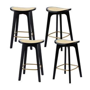 Grantville backless woven rattan bamboo bar stool at a kitchen counter
