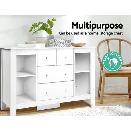 White baby change table with four drawers and four open shelves