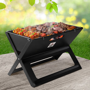 Munglinup foldable portable charcoal BBQ grill with X leg design for camping