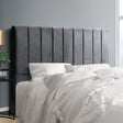 Anembo grey velvet bed head in a modern bedroom