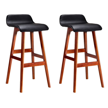 Moorabbin black bentwood faux leather bar stool at a kitchen counter