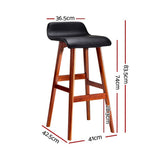 Moorabbin black bentwood faux leather bar stool at a kitchen counter