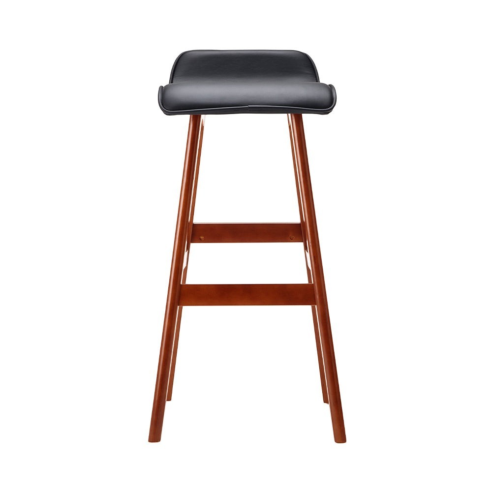 Moorabbin black bentwood faux leather bar stool at a kitchen counter