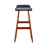Moorabbin black bentwood faux leather bar stool at a kitchen counter