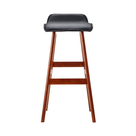 Moorabbin black bentwood faux leather bar stool at a kitchen counter