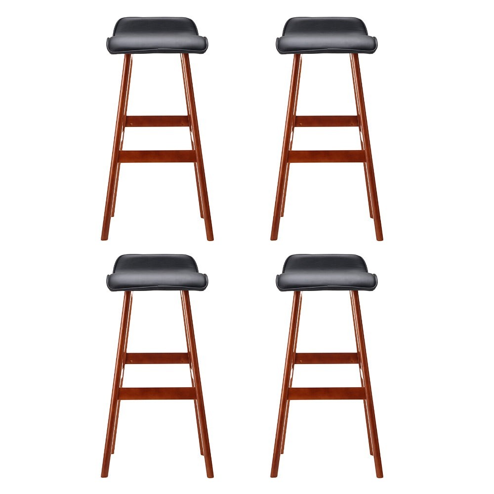 Moorabbin black bentwood faux leather bar stool at a kitchen counter