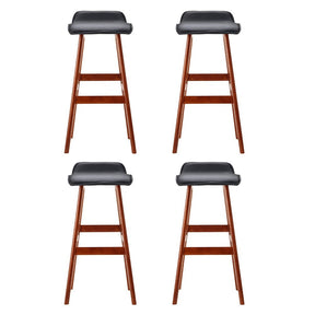 Moorabbin black bentwood faux leather bar stool at a kitchen counter