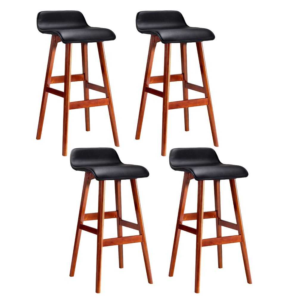Moorabbin black bentwood faux leather bar stool at a kitchen counter