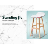 Side profile of Artiss Sliva white bar stool showing wooden frame — Allure Home Collections