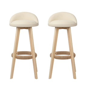 Ventnor beige padded bar stools pair with low backrests and wooden frames