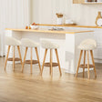 Skye beige bentwood bar stool with padded leather seat in a modern kitchen
