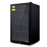 98 L glass door bar fridge in a home bar or cafe setting
