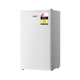 95 L white bar fridge stocked with drinks in a home bar setting