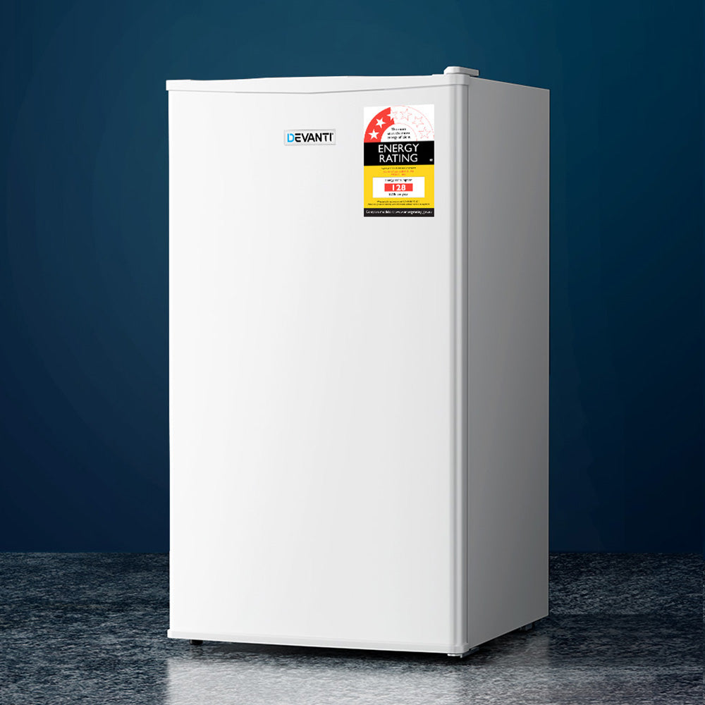 White 95 L bar fridge with door closed, front view