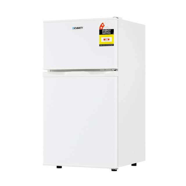 Dimension view of the 85 L white bar fridge, 85.5 cm high