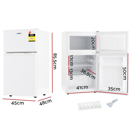 85 L white bar fridge shown at an angle with door closed