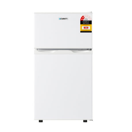 Bar fridge interior with shelves, crisper drawer and chiller compartment
