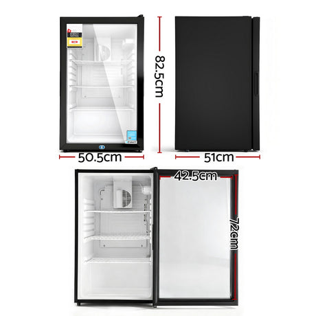 Bar fridge front view with glass door closed and LED interior light on