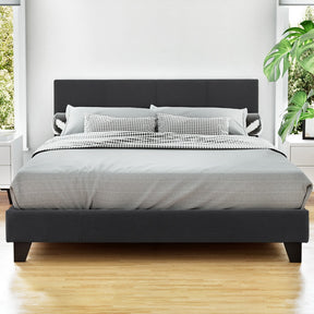 Pyrmont double upholstered bed in charcoal faux linen with a padded bedhead in a modern bedroom