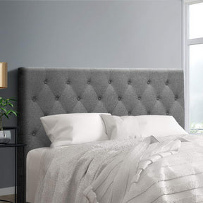 Yaouk grey upholstered bed head in a modern bedroom