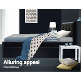 Artiss black king single trundle daybed styled in bedroom — Allure Home Collections