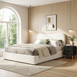 Soldiers Point double bed in beige boucle with a matching black bedside table in a soft bedroom