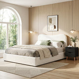 Soldiers Point double bed in beige boucle with a matching black bedside table in a soft bedroom