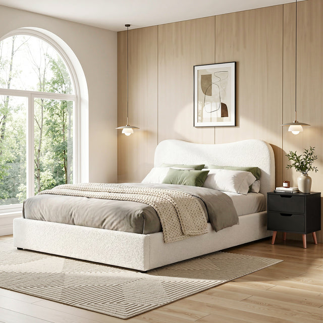 Soldiers Point double bed in beige boucle with a matching black bedside table in a soft bedroom