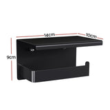 Wall mounted black toilet roll holder with a phone resting on its shelf