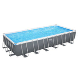 Extra large rectangular above ground steel frame swimming pool in a backyard