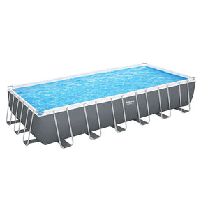 Extra large rectangular above ground steel frame swimming pool in a backyard
