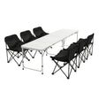 Seven piece camp set with folding table and six chairs arranged outdoors