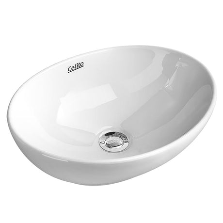 White oval ceramic vanity basin, 41x34cm above counter