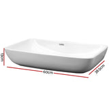 Wide white ceramic above counter basin, front view, 60x38cm