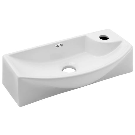 Compact white wall hung ceramic basin, 46x22cm with tap hole