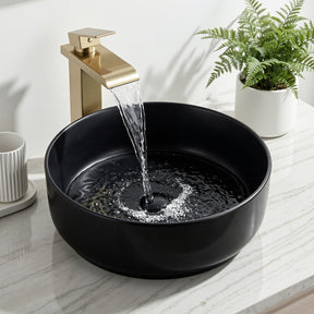 Round ceramic vessel basin in matte black, 35.5cm above counter basin