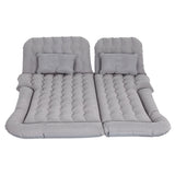 Grey inflatable SUV back seat car mattress with pillows