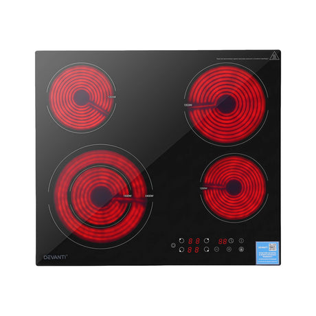 Dual ring cooking zone glowing on the black ceramic glass surface