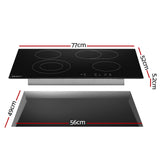 Dual ring and oval ring zone markings on the black glass surface