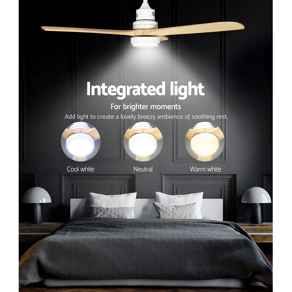 Light wood ceiling fan installed in a living room ceiling