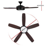 Underside of the five blade dark wood ceiling fan showing LED light