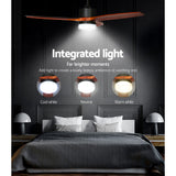 Dark wood ceiling fan installed in a living room ceiling