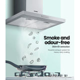 Removable aluminium grease filter being lifted out of the rangehood