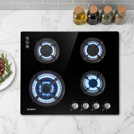 60 cm black tempered glass gas cooktop with four burners and cast iron grates